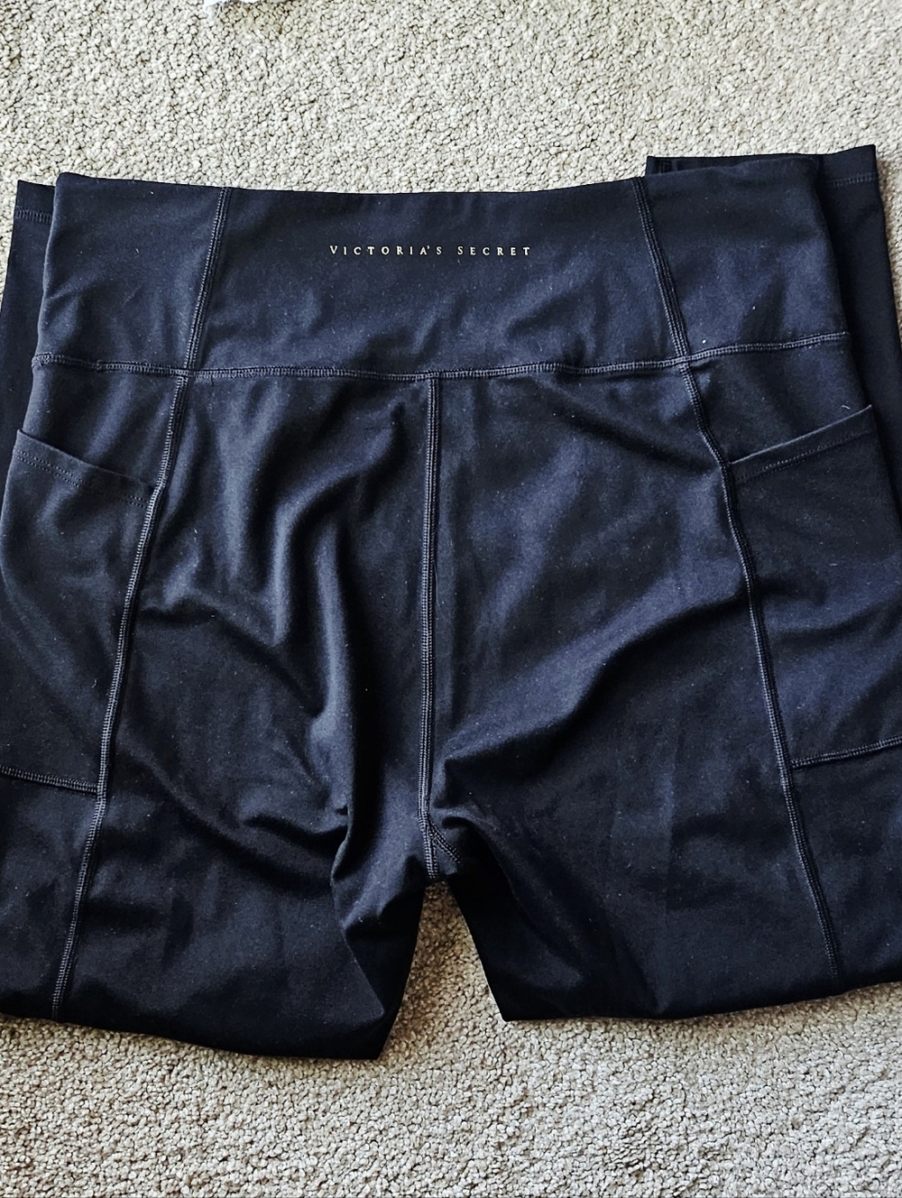 Victoria's Secret black leggings with phone pockets Size large